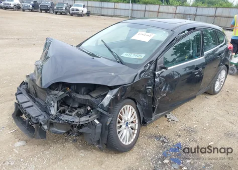 2014 Ford Focus Titanium z USA, uszkodzony, nr VIN 1FADP3N25EL194433